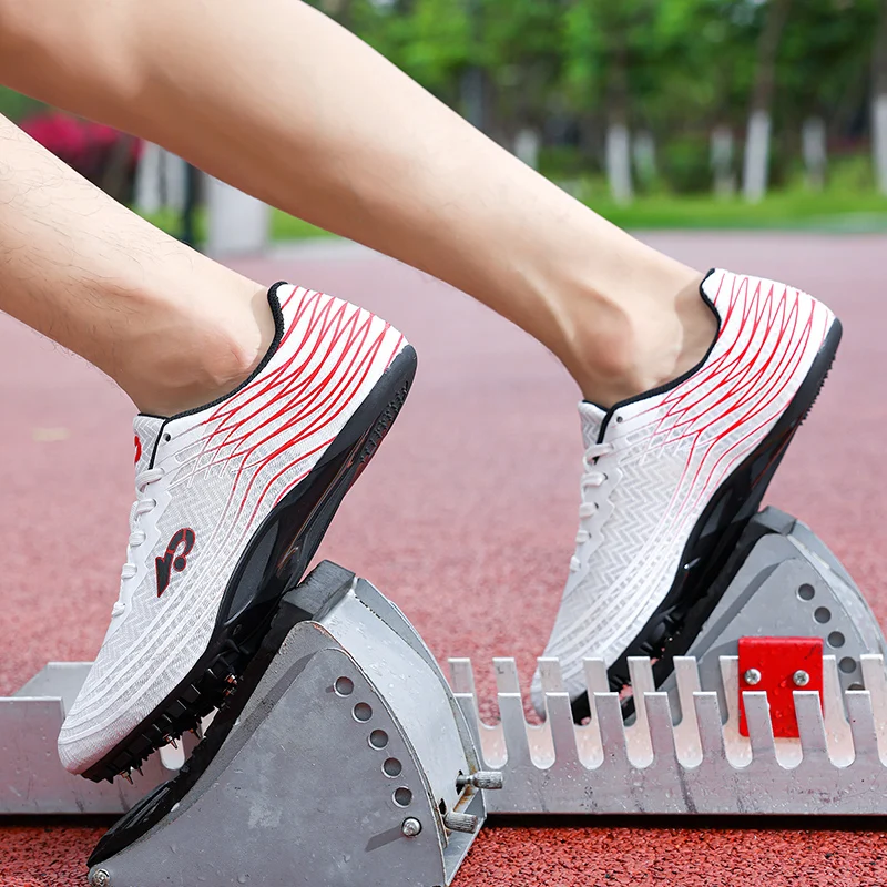 2025 New Men Women Track and Field Shoes Non Slip Spiked Running Shoes Comfortable Outdoor Sneakers Low Top Track Training Shoes