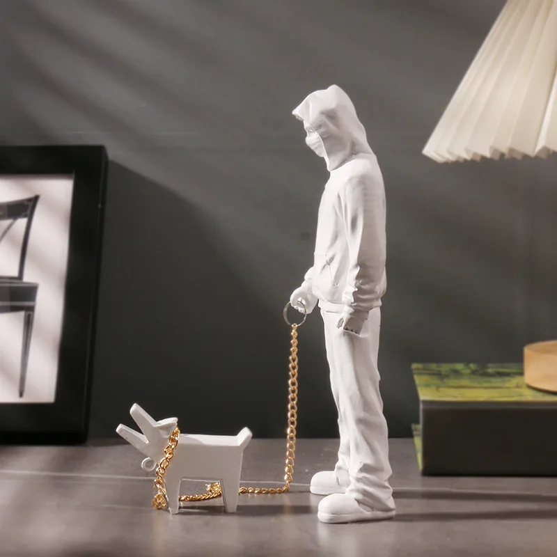 Creative Banksy Is A Fashionable Man Who Plays with Dogs, White Fashionable Toys, Art Sculptures