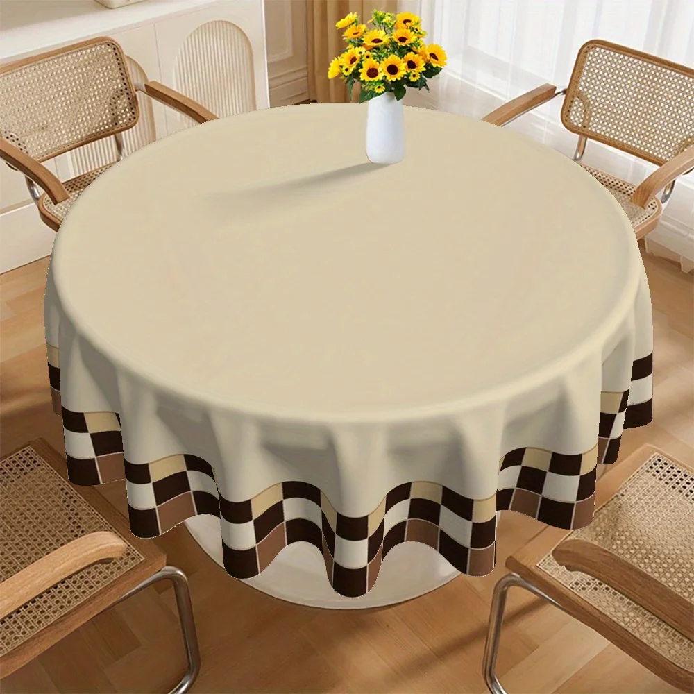 One checkered Christmas tablecloth, specially designed for round tables, is perfect for family kitchens.zyc