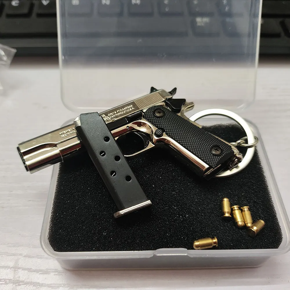 1:3 M1911 المفاتيح قذيفة إخراج 92F مسدس لعبة جمع سبيكة مسدسات مفتاح سلسلة هدية للرجال الأولاد جمع