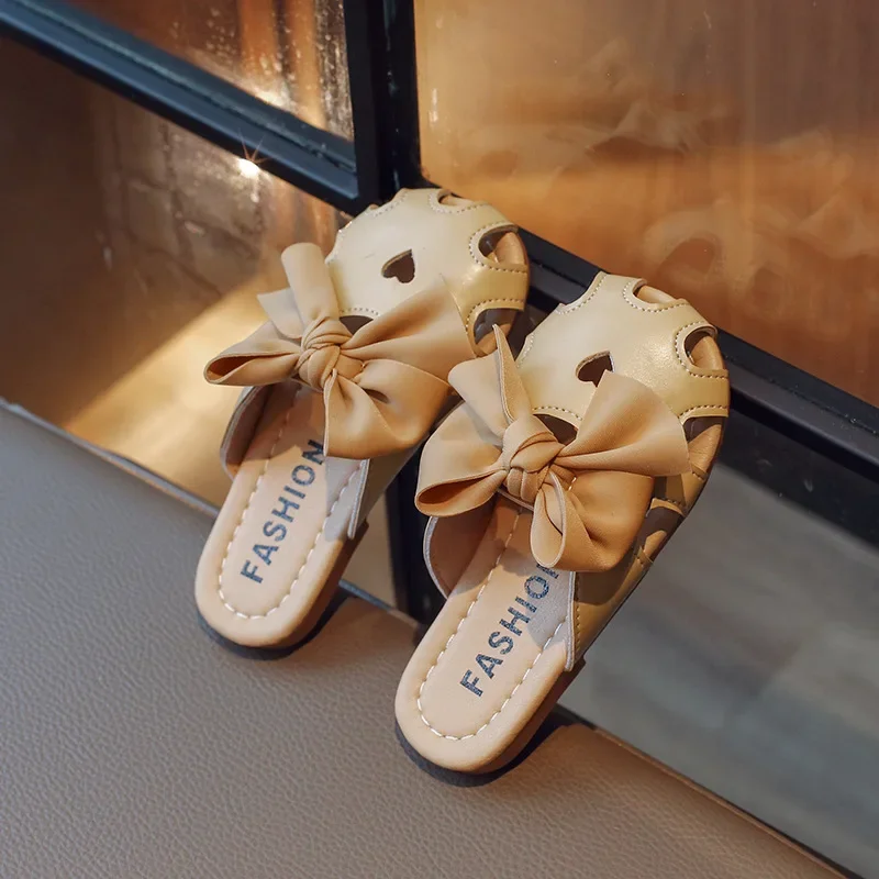 Zapatos de cuero PU con agujeros en forma de corazón para niños, zapatillas de princesa con lazo para niña, zapatillas de Color sólido, suela blanda con lazo, zapato para niño pequeño