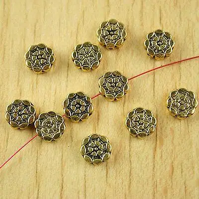 

40pcs 7.7mm dark gold-tone flower spacer beads h1873