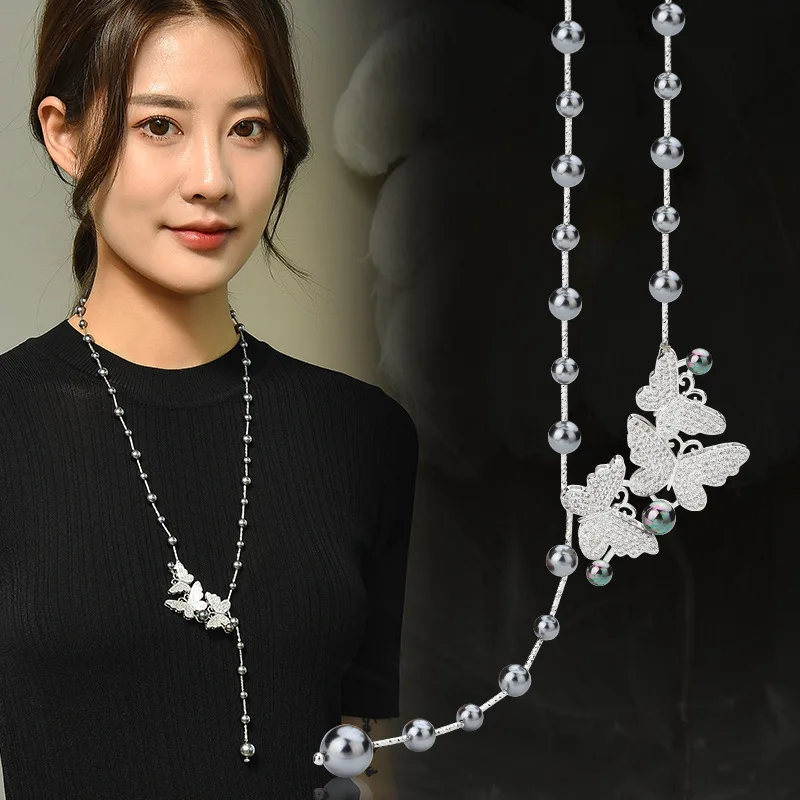 

Pearl butterfly tassel necklace, women's light luxury bow sweater chain, fashionable tassel long necklace