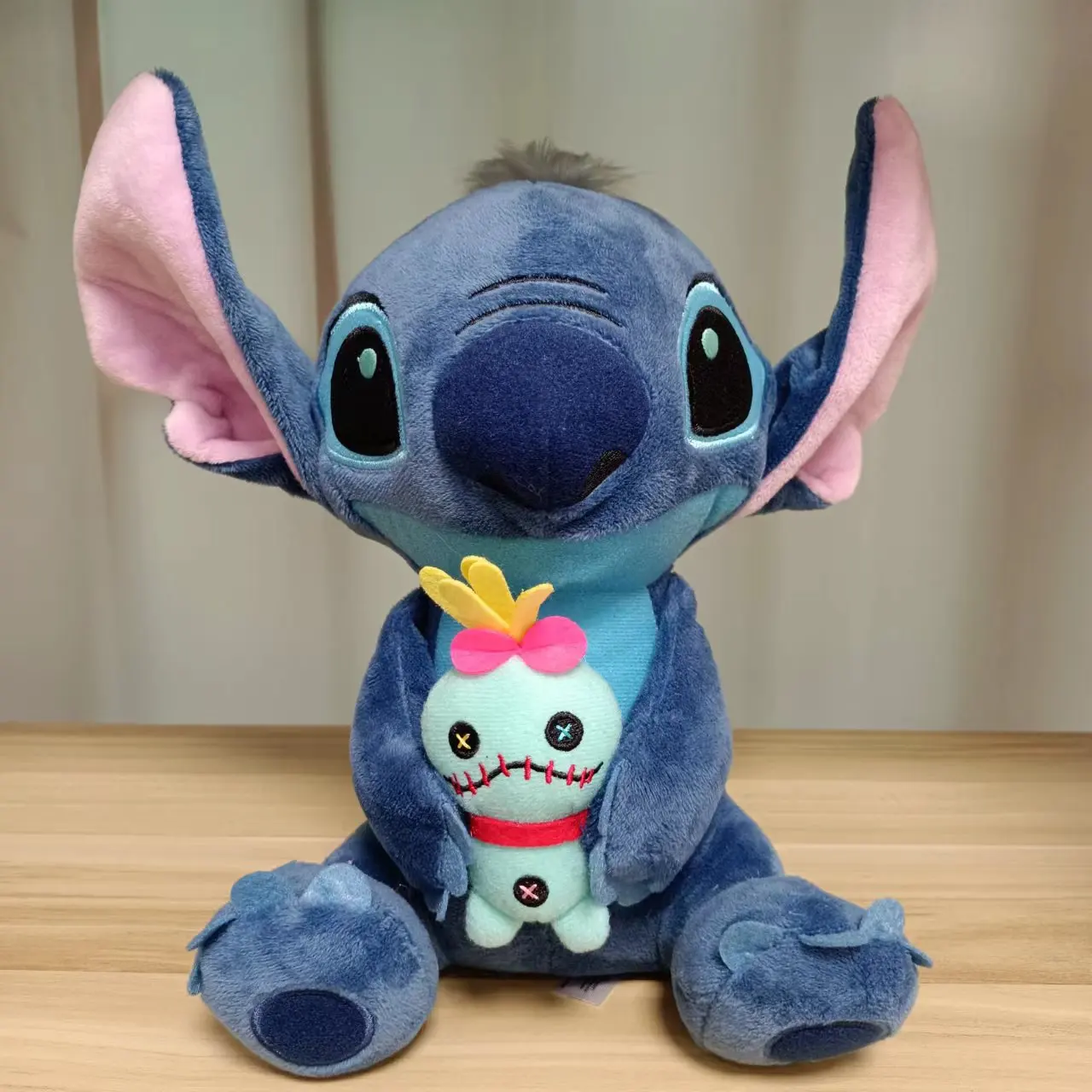 Hot Kawaii Disney Stitch bambola di peluche giocattoli Anime Lilo & Stitch bambola di pezza carino Stich bambola di peluche regalo di compleanno per bambini giocattolo per bambini