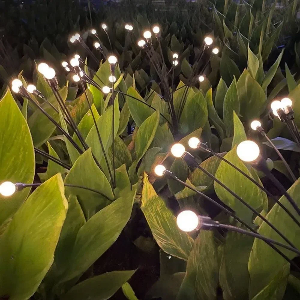 

Solar-Powered Outdoor LED Firefly Lights - Waterproof Starburst String Lamps for Decorative Garden, Lawn, and Pathway Lighting