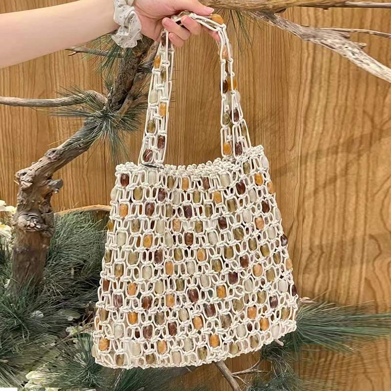 

New Style Casual Beaded Ladies Handbags Fashionable Niche High-end Woven Shoulder Bag Plaid Hollow Wooden Beads Travel Beach Bag