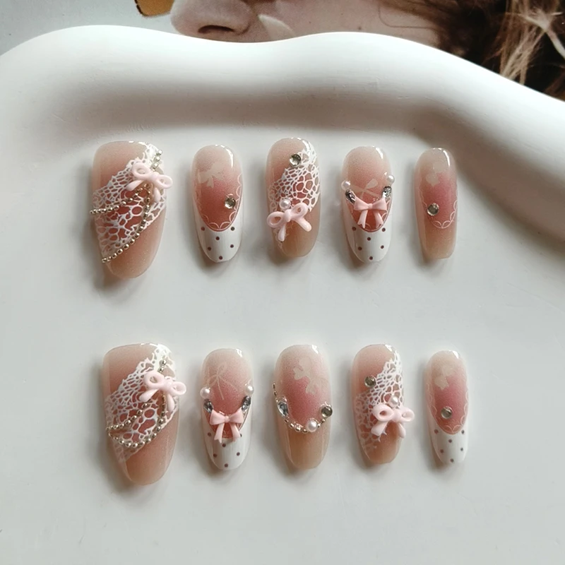 10 faux ongles à presser faits main, style français, avec nœud 3D, strass et motif pois, forme amande, design délicat et charmant