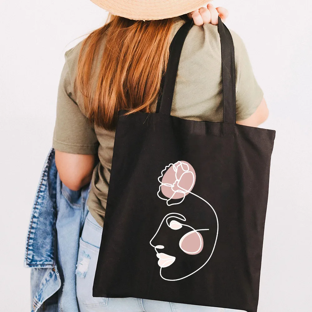 Bolso de mano de algodón de lona para mujer y niña, bolsa de mano con diseño geométrico de una línea de cara de flor minimalista abstracta, bolso de compras para estudiantes