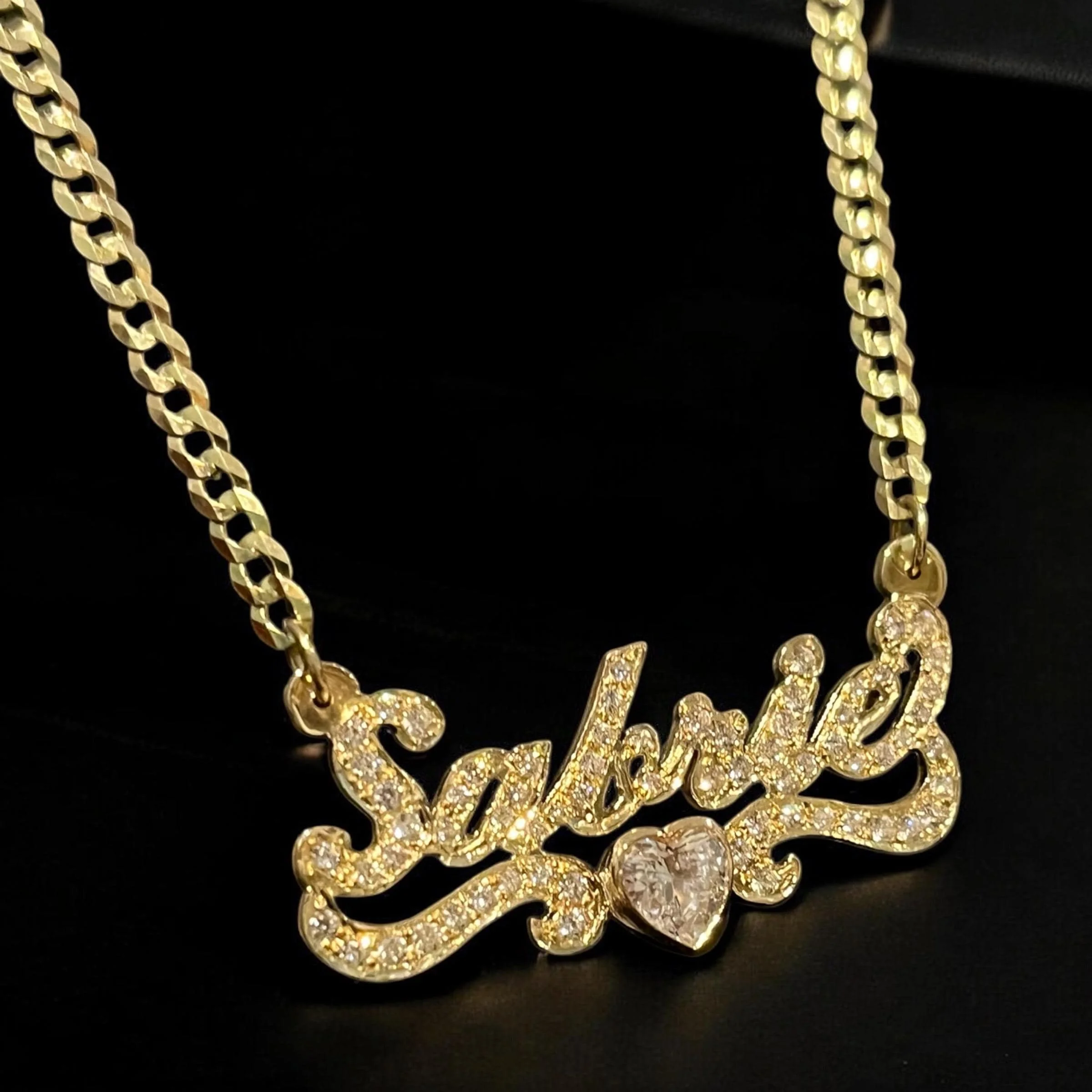 

A Personalized Handmade Necklace with A Custom Diamond Nameplate and Heartshaped Birthstone Give Her A Unique Memory Gift