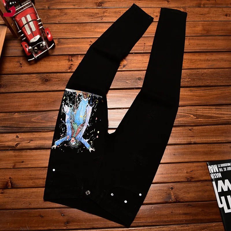 

Autumn and winter black jeans men's Hole & patch stretch slim fit skinny personality clown printed smart trousers