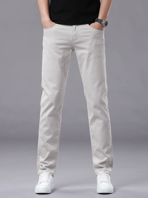 

Гонконгские высококачественные летние новые джинсы Slim Fit с прямым кроем, эластичные, повседневные, универсальные, длинные, цвета тан, из хлопка со стрейчем