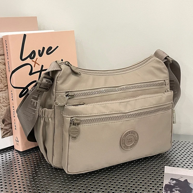 

Повседневная нейлоновая многослойная сумка через плечо на одно плечо для женщин, новинка 2024, большая вместительная маленькая сумка для путешествий на открытом воздухе