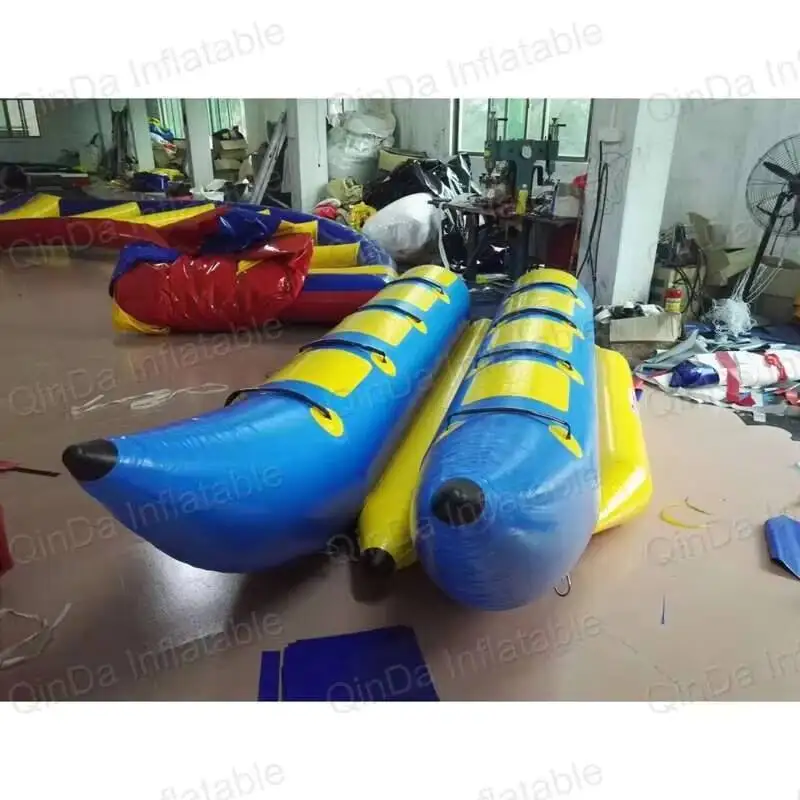 4 + 4 0,9 mm Lona de PVC Juegos acuáticos inflables Precio del barco de plátano / Barco de peces voladores a la venta