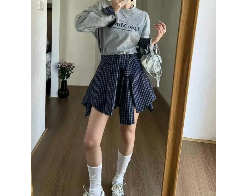 2025 ฤดูร้อนใหม่การออกแบบไม่สม่ําเสมอเอวยางยืด Checkered กระโปรงครึ่งความยาวสําหรับผู้หญิง