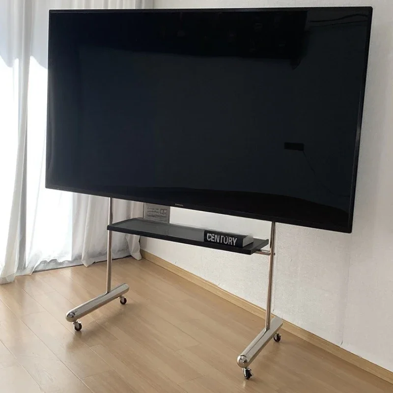 Medieval stainless steel living room TV stand, floor standing, simple and movable with wheel display, hanging rack trolley