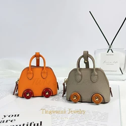 New fashionable mini car wheel bag, shell bag pendant, headphone bag, keychain bag, bag ornament, coin purse.