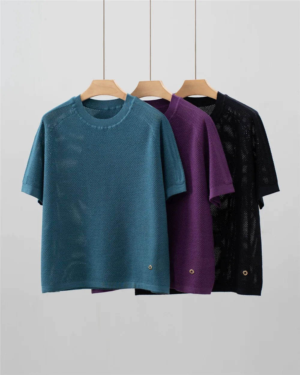 

25 Autumn New Women's Round Neck Loose Hollow Knitted Short Sleeve Top