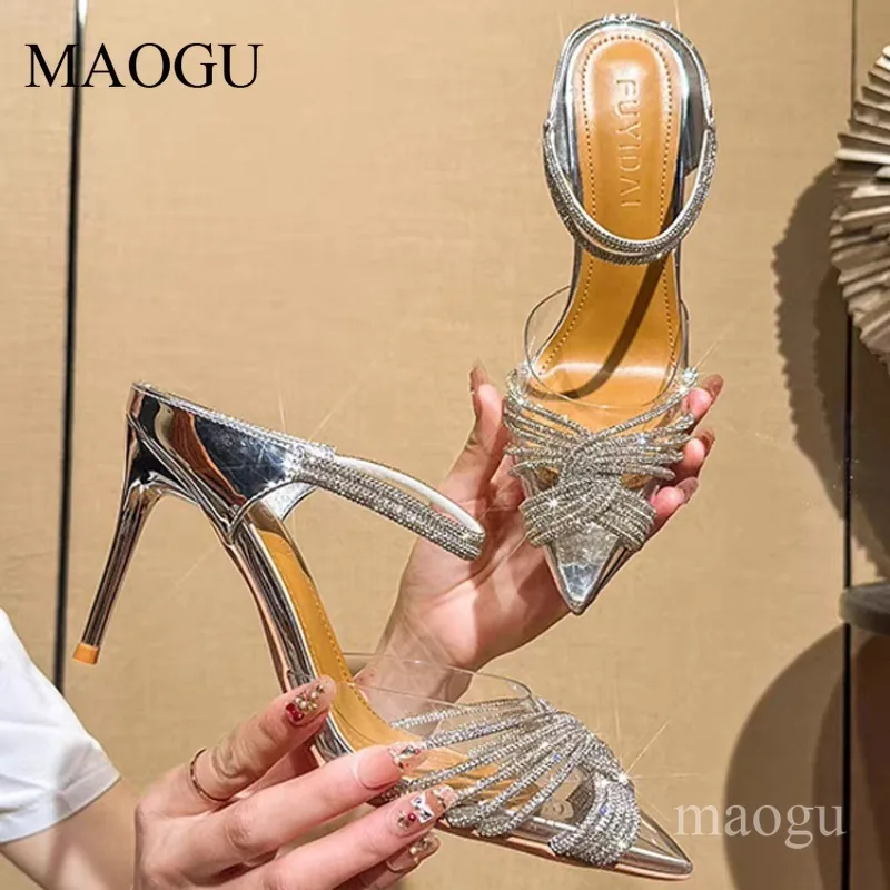 Sandalias de tacón de aguja con punta en pico y diamantes de imitación plateados para mujer, de PVC transparente, con tira trasera, sin talón, para fiesta