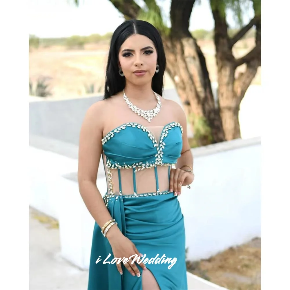 Abito da ballo senza maniche in cristallo con sirena a cuore blu con scollo a cuore senza schienale Sweep Train Abiti da sera lunghi fino al pavimento pieghettati personalizzati