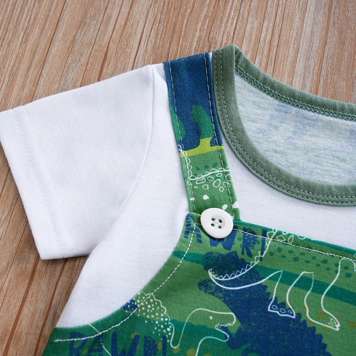 Urnxb-رومبير بأكمام قصيرة مع طبعة ديناصور لحديثي الولادة ، بذلة قطعة واحدة مع حمالة للأولاد من 0 إلى 12 عامًا ، الصيف