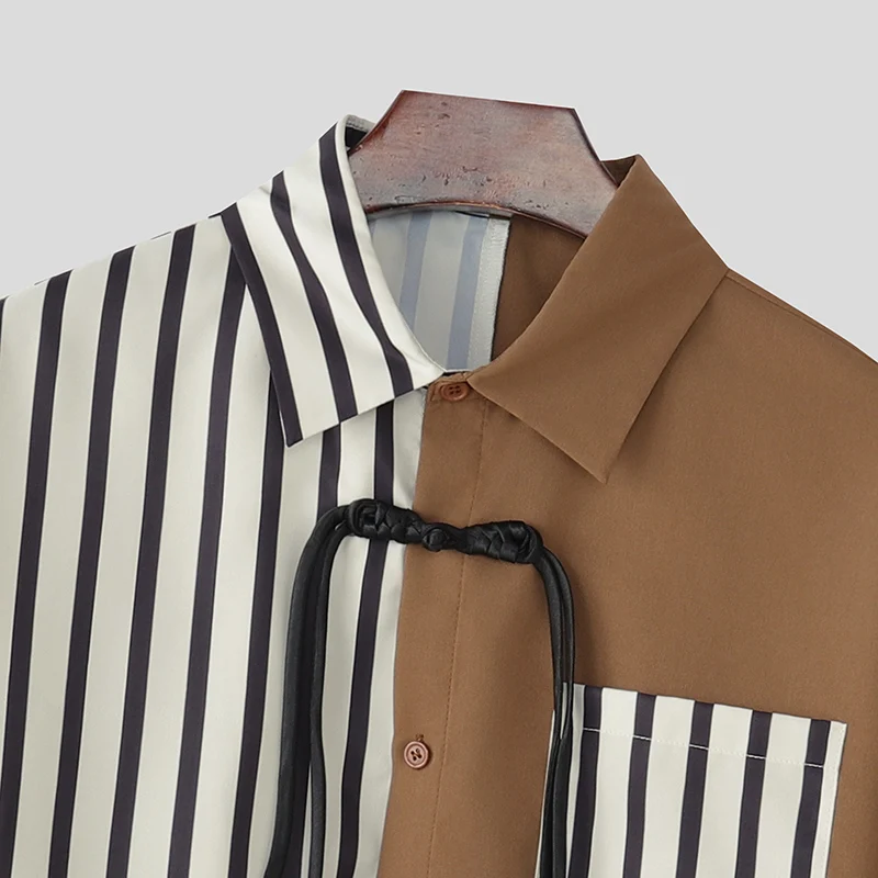 INCERUN เสื้อเชิ้ตผู้ชายลายทางต่อผ้าปกเสื้อแขนยาวติดกระดุมเสื้อผู้ชายสตรีทแวร์ทรงหลวมแฟชั่นสไตล์เกาหลีเสื้อผ้าลำลองผู้ชาย