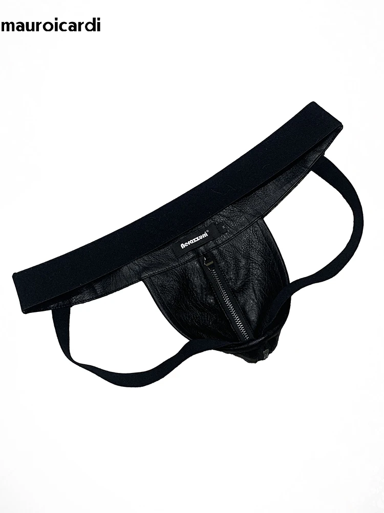 Primavera Verano negro Pu pantalones cortos de cuero para hombres cintura elástica diseñador de lujo Emo estilo Punk ropa interior para hombres Tanga Sexy