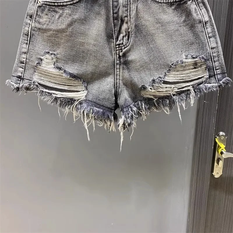 Worn Legs with Rough Edges Washed Black Denim Shorts 2026 Summer New Women Fashion A-line Wide Leg Hole Ripped Denim Shorts