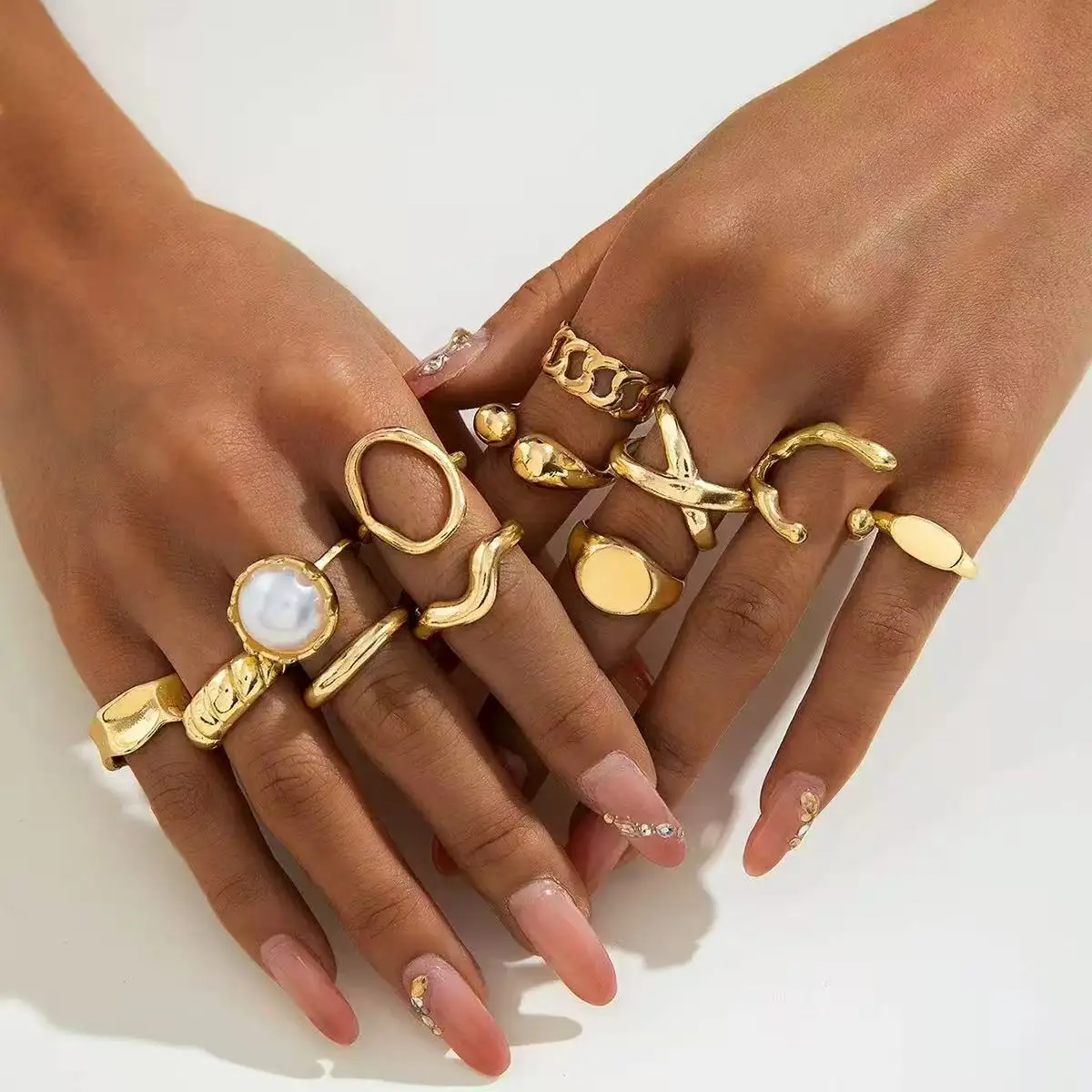 Juego de anillos brillantes de diseño moderno de 12 piezas con conjunto de anillos para juntas con apertura de cara de arco geométrico exagerado, adecuado para fiesta de mujer