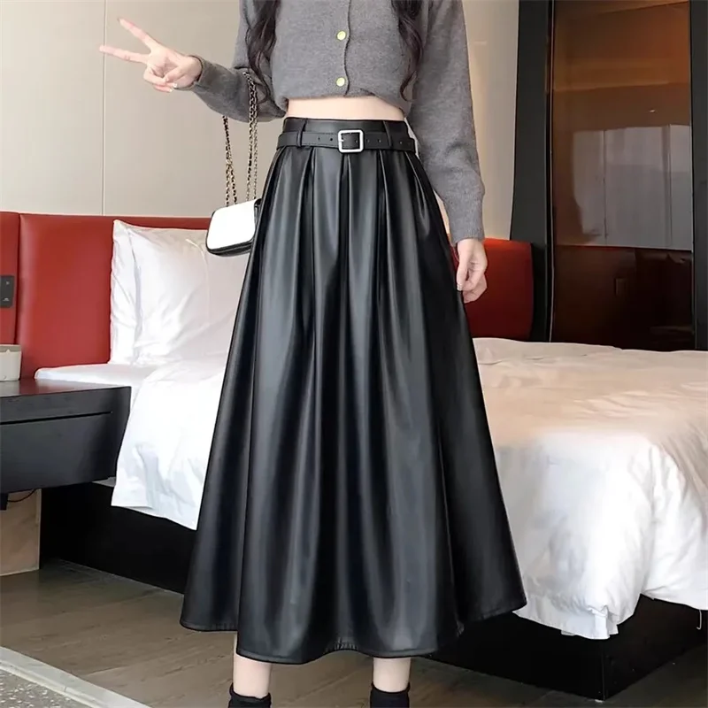 أسود فو بولي Leather جلد المرأة ألف خط التنانير 2026 جديد الخريف الشتاء عالية واسط الصلبة شيك مظلة مكتب التنانير الإناث #3