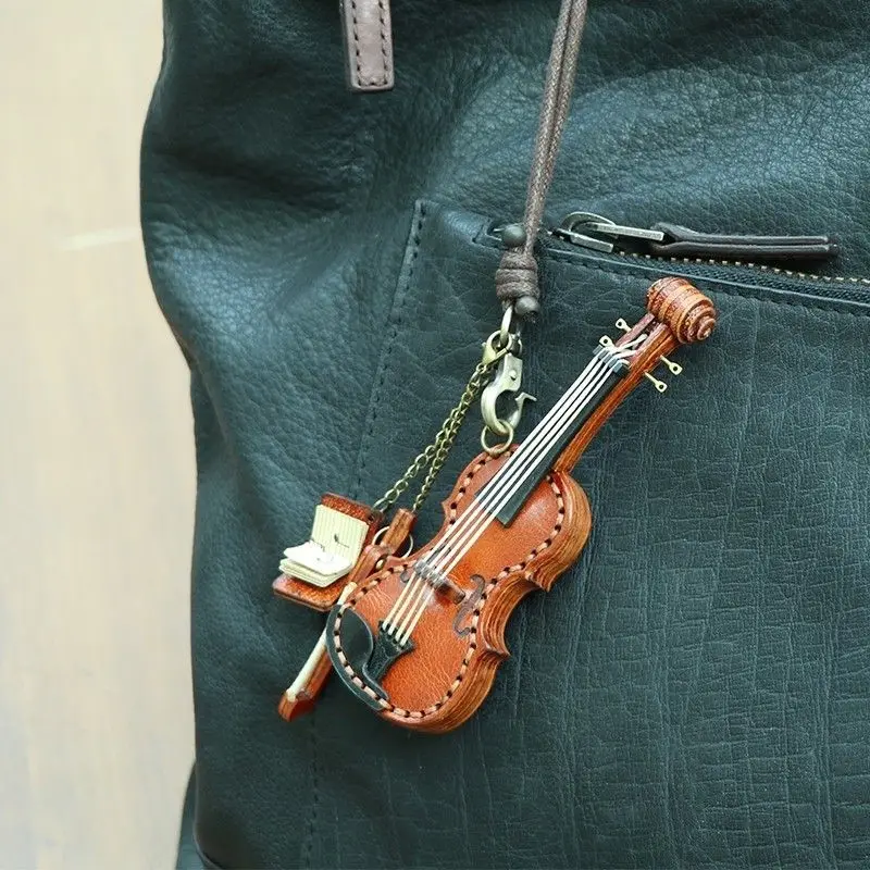 

New Leather Fashion Violin Bag Exquisite Pendant Simple Musical Instruments Hand Rope Car Pendant Cute Key Lanyard Music Score