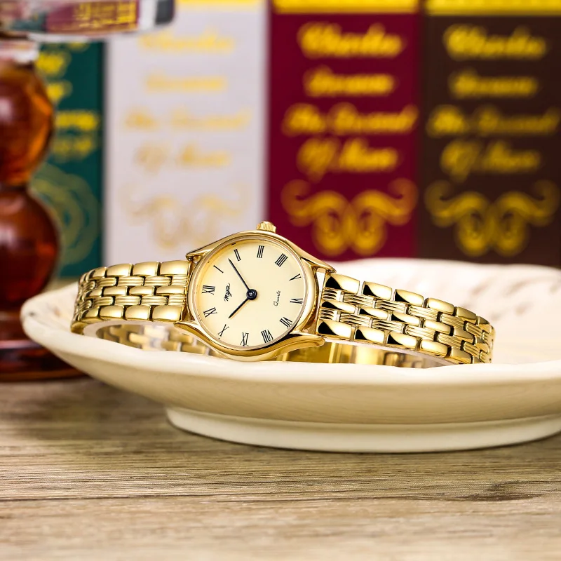 ساعة يد نسائية أنيقة طراز عتيق كلاسيكي بسوار فولاذي بسيط صغير ساعة ذهبية اختيار راقي هدية مثالية للنساء. #4