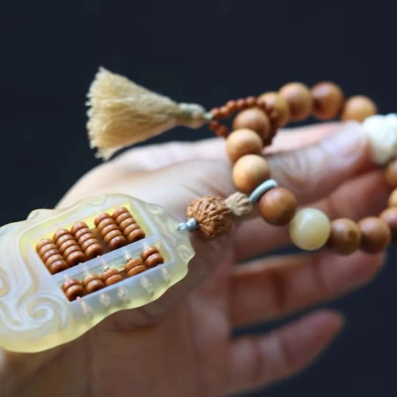 accessories with ram horns, high-oil cypress, ivory beads, lion charm, and olive stone bracelets are fashionable jewelr