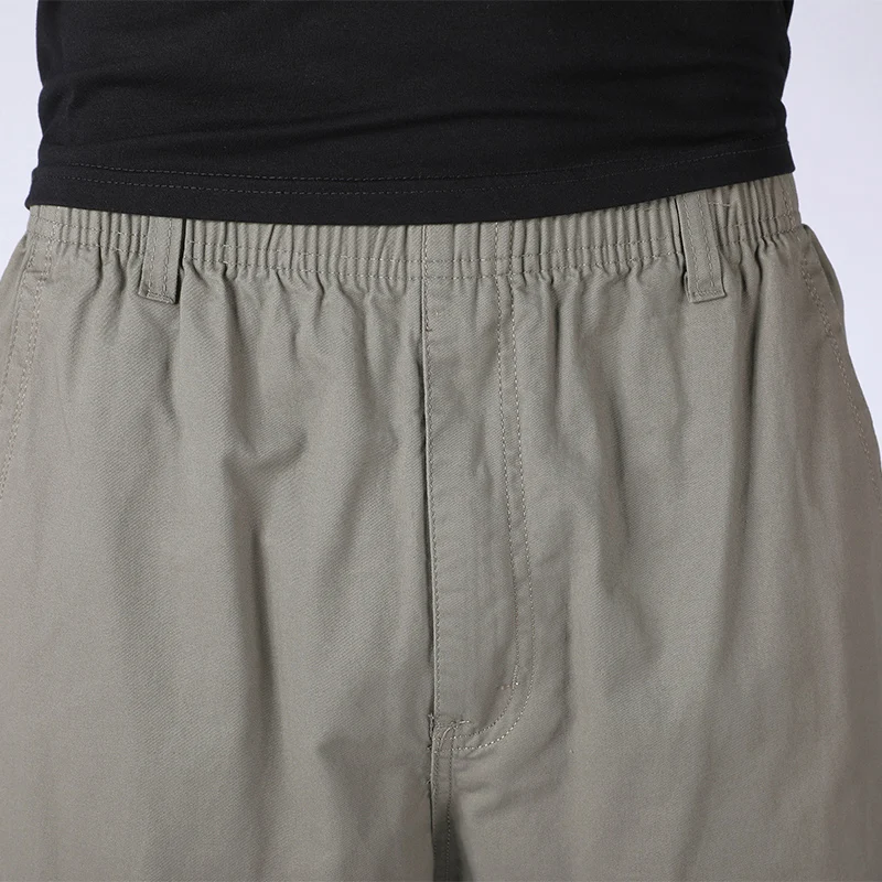 กางเกงขายาวผู้ชายผ้าคอตตอนเนื้อบางระบายกางเกงผู้ชายขาสามส่วนหลวมกางเกงขายาวแนวสตรีทแวร์สีล้วนใหม่ฤดูร้อน