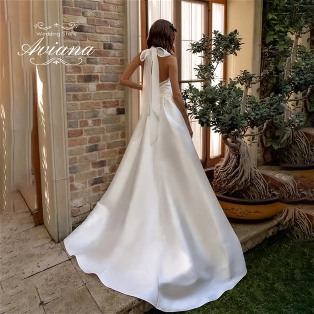 Aviana ที่กําหนดเองลูกไม้ Appliques สูงด้านข้างแยก A-Line ชุดแต่งงาน Sweep Train ความยาวชั้นเย็บปักถักร้อยแขนกุด Elegant