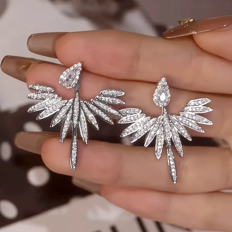 New Creativity Crystal Angel Wings Symmetrical Stud Earrings for Women Unique Design Exquisite Silver Color Party Jewelry Gifts