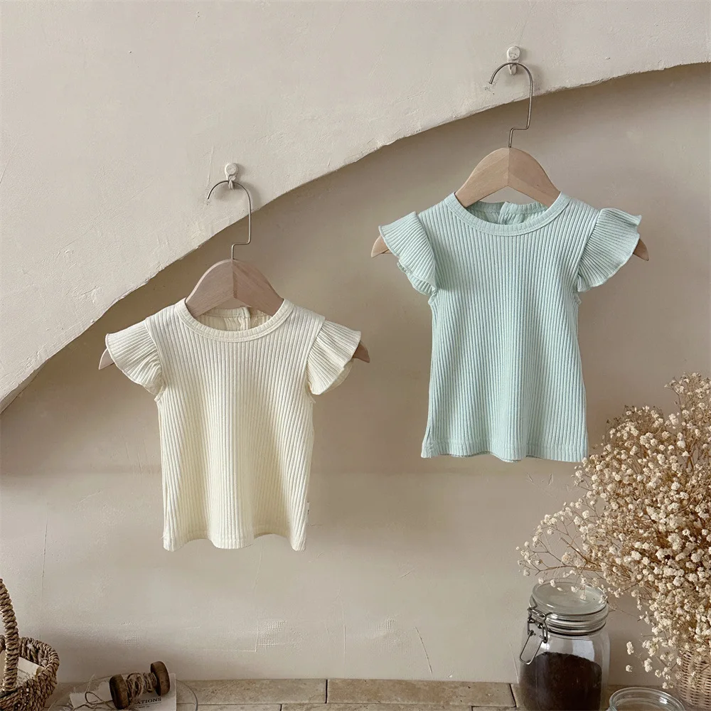 

2026 Summer New Baby Girl Flying Sleeve T Shirts Solid Simple Girls Thin Ribbed Bottoming Shirts Cotton Toddler Clothes