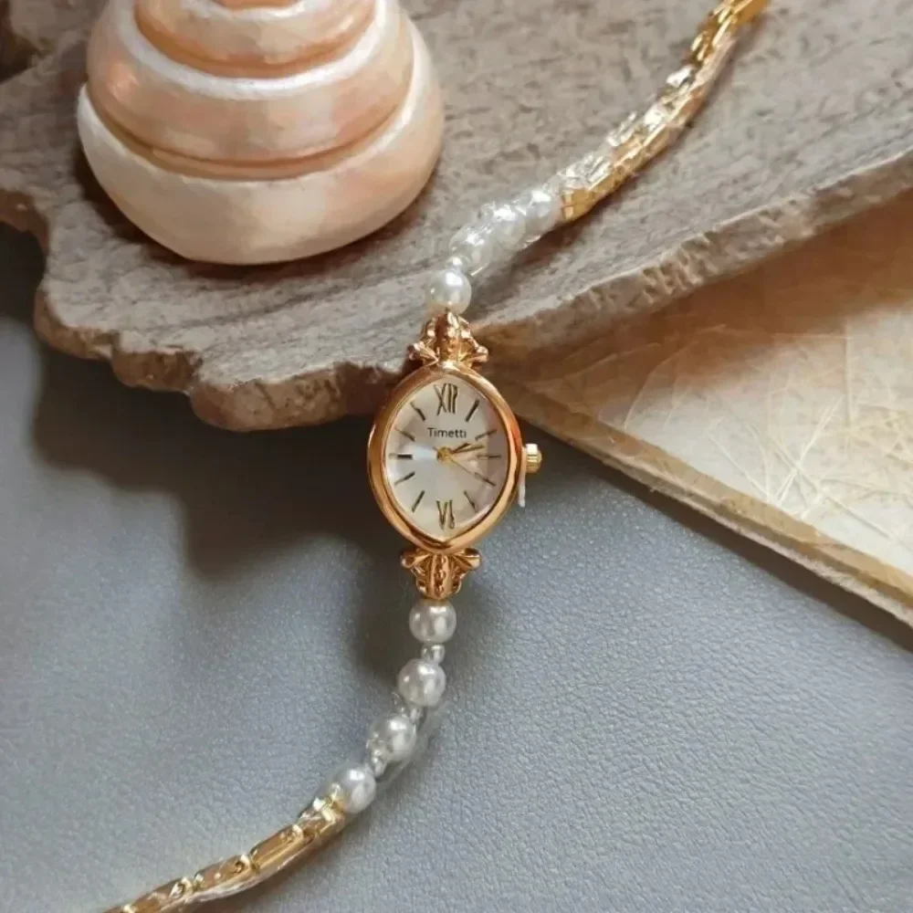 

Новые женские часы в стиле ретро с золотым маленьким римским циферблатом Y2K, роскошный дизайн, часы-браслет с жемчугом для девочек, элегантные женские кварцевые наручные часы в подарок