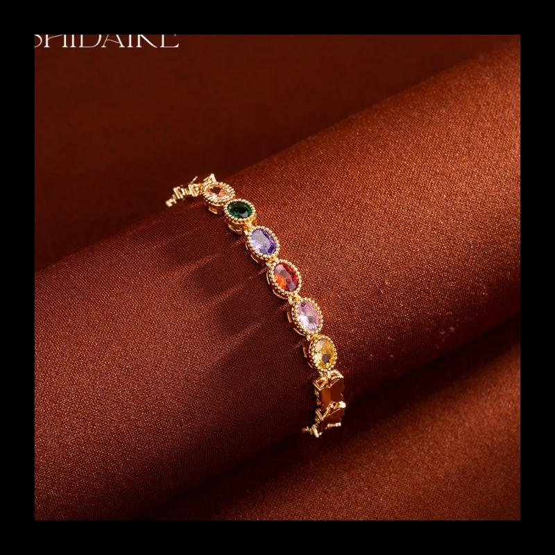 

Новый круглый браслет с медной инкрустацией цветным цирконом, высококачественный дизайн, изысканные выдвижные украшения