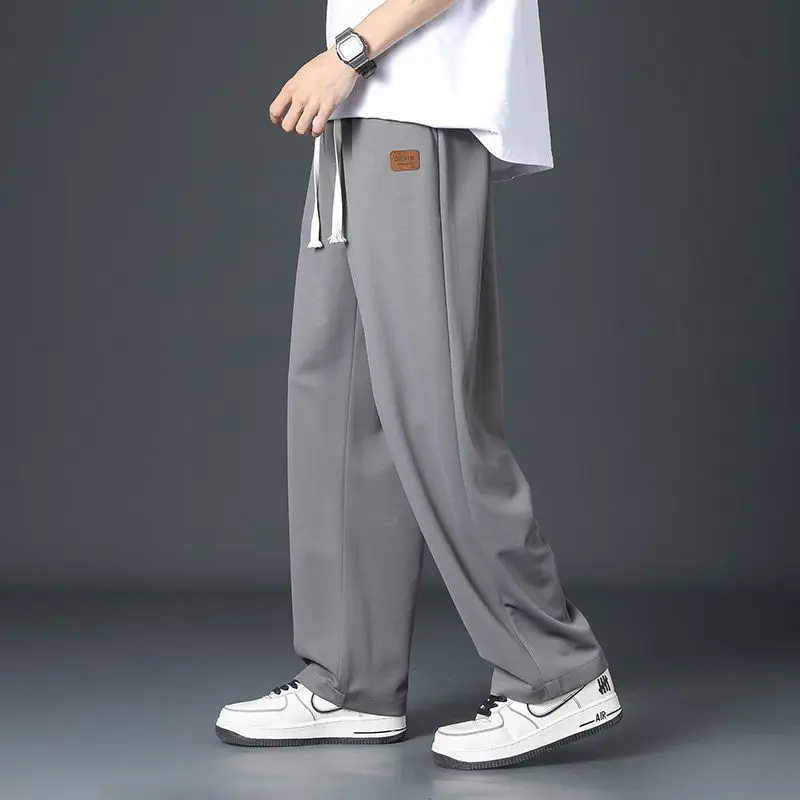 Pantalones de pierna ancha con parche de seda fina para hombre, pantalones clásicos de calle, informales, sueltos, rectos, con cintura de cilindro,