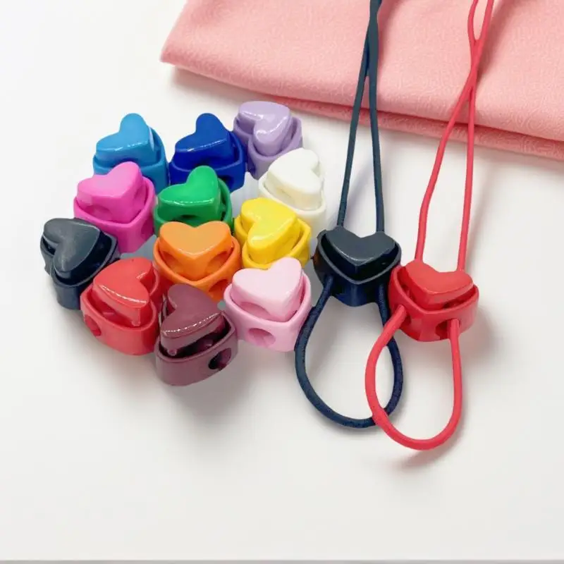 5pcs Colorful Heart-Shaped Plastic Cord Locks Garment Stoppers Double Hole Spring Toggle Anti-slip Stoppers Garment Accessories