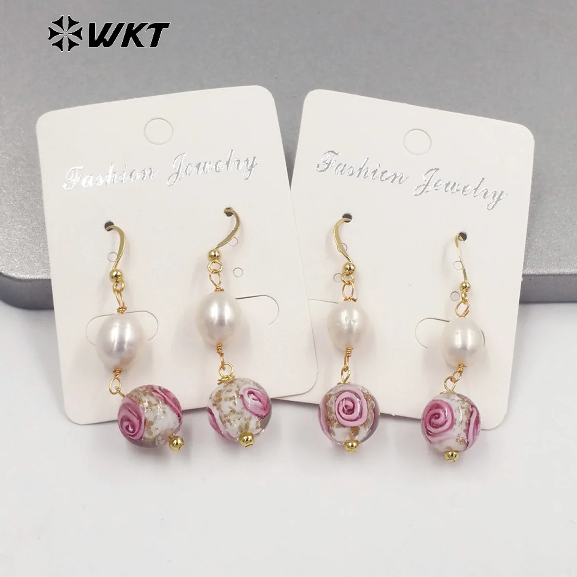 

WT-MPE098 French High-End Luxury Rose Beads Pearl Elegant Temperament Long Earrings For Anniversaries Gift