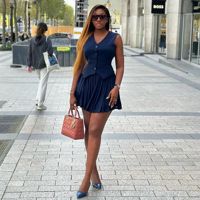 

New solid color V-neck sleeveless vest top pleated skirt suit fashionable simple and versatile temperament elegant holiday style