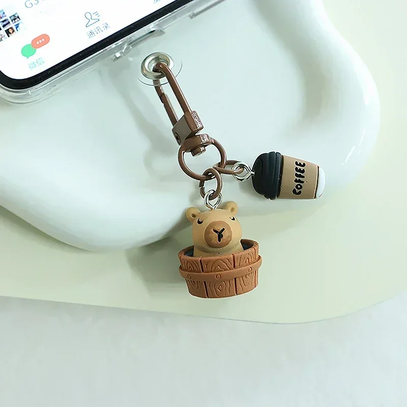 

New 2024 Cartoon Kapibala Key Chain Capybara Phone Pendant Headphone Case Charms Bag Decor Car Key Ring