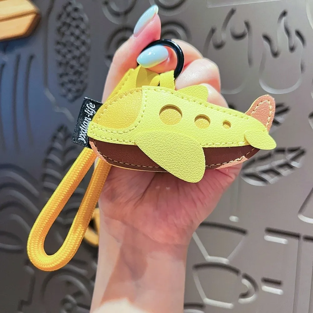 Simpatico cartone animato portachiavi per aereo Borsa da trasporto in pelle PU Decorazione da appendere Ciondolo per borsa di lusso unico Uso quotidiano