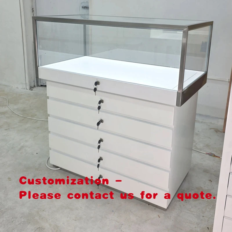 

Самый популярный индивидуальный низкопрофильный шкаф-витрина для ювелирных изделий большой вместимости с LED-подсветкой, пятью выдвижными ящиками и отдельными секциями.