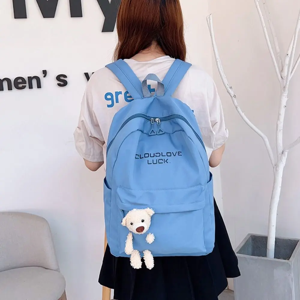 

Large Capacity Student Schoolbag Aesthetic Schoolbag Solid Color Simple Backpack Nylon Bags with Doll Niche Campus Backpack