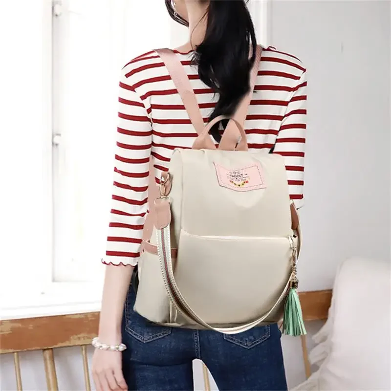 Bolso de hombro de alta calidad para mujer, bolsas de tela Oxford de gran capacidad, mochila para mujer, bolso de mano de Color para niña, paquete de hombro para mujer