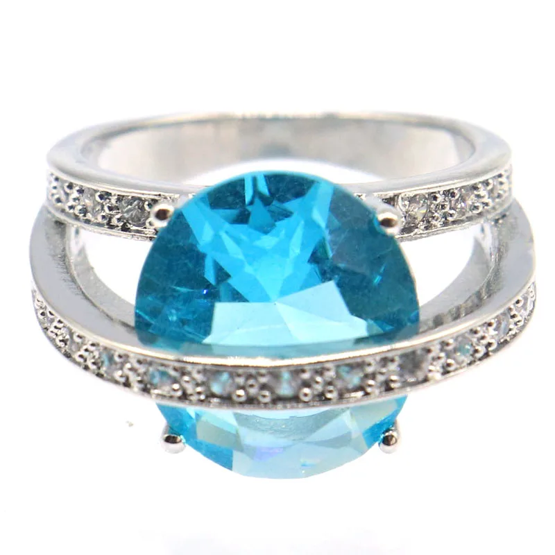 

22x14 мм, рекомендуем небесно-голубой топаз, танзанит, белый CZ, женские обручальные серебряные кольца