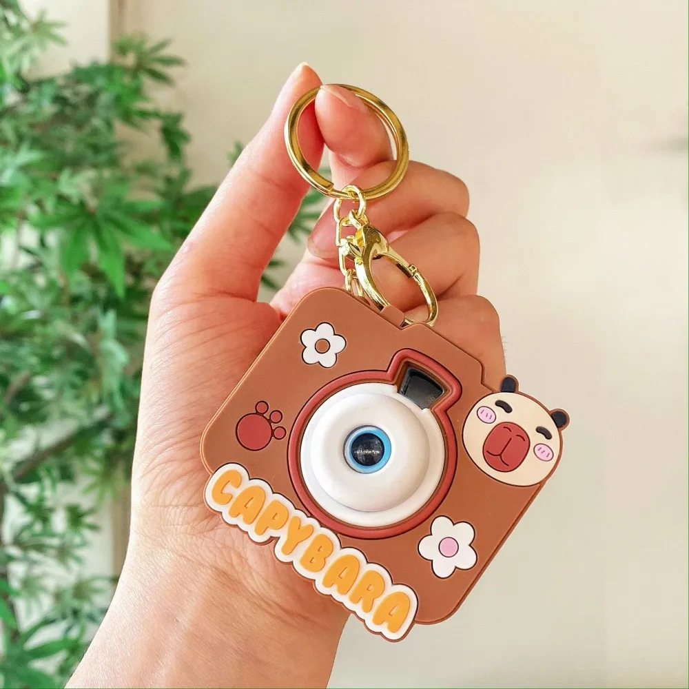 

2Pcs With Flashlight Capybara Projection Camera Keychain Simulation Luminous Creative Cartoon Key Ring Cute Projection