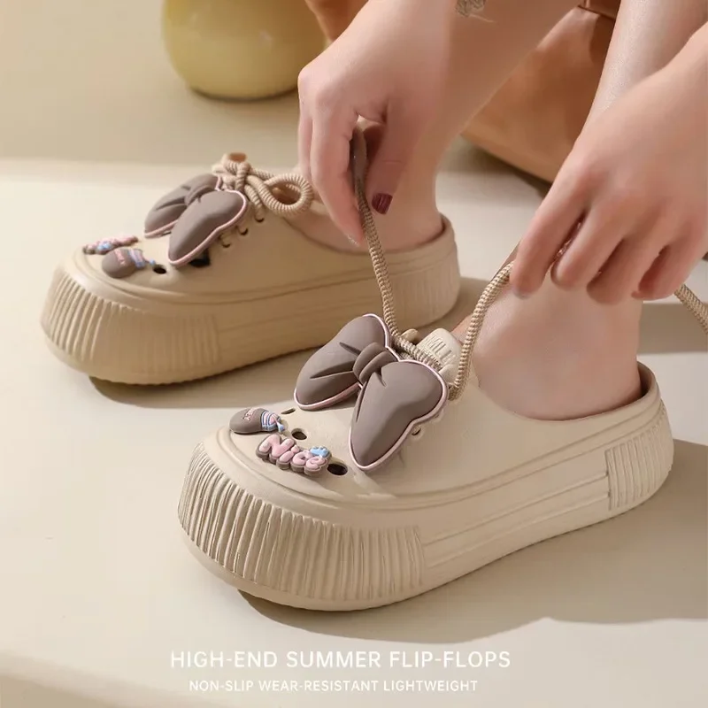 Pantofole da donna con fiocco adorabile sensazione estiva all'esterno indossare Eva con suola spessa casa Indoor donna fori scarpe sandali scarpe da giardino da spiaggia